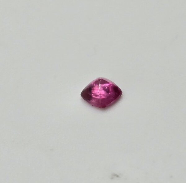 3.83x3.66x2.44mm spinel sugarloaf-cut cabochon