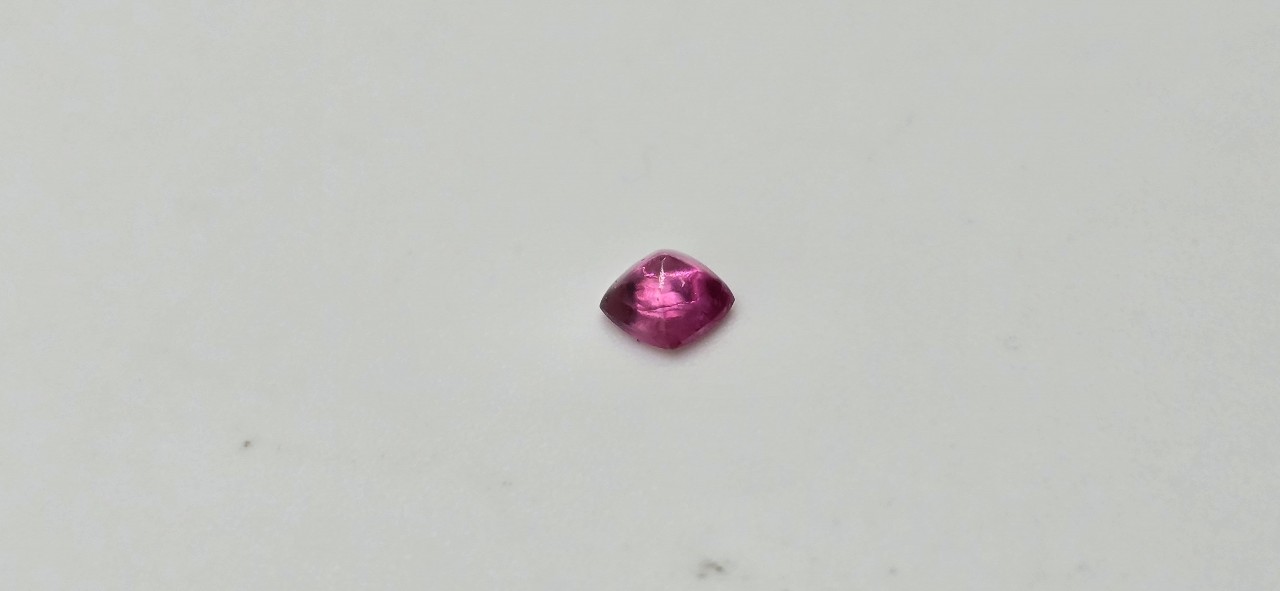 3.83x3.66x2.44mm spinel sugarloaf-cut cabochon