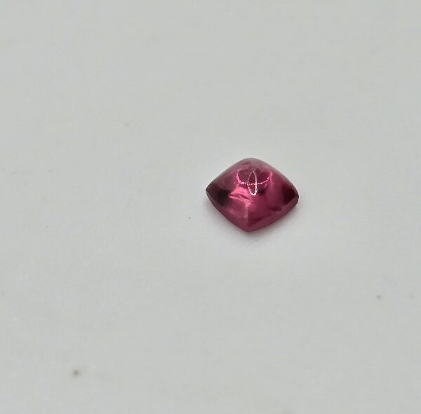 3.45x3.38x2.12mm spinel sugarloaf-cut cabochon