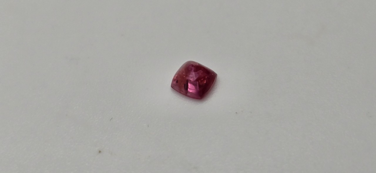 3.83x3.71x2.95mm spinel sugarloaf-cut cabochon