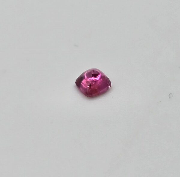 3.52x3.44x2.38mm spinel sugarloaf-cut cabochon