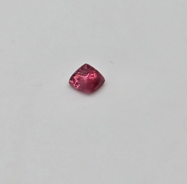 3.58x3.46x2.86mm spinel sugarloaf-cut cabochon