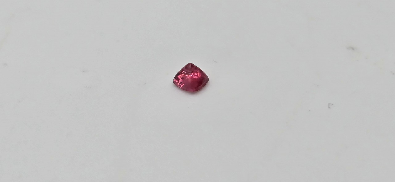 3.58x3.46x2.86mm spinel sugarloaf-cut cabochon