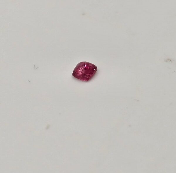 2.89x2.80x1.75mm spinel sugarloaf-cut cabochon