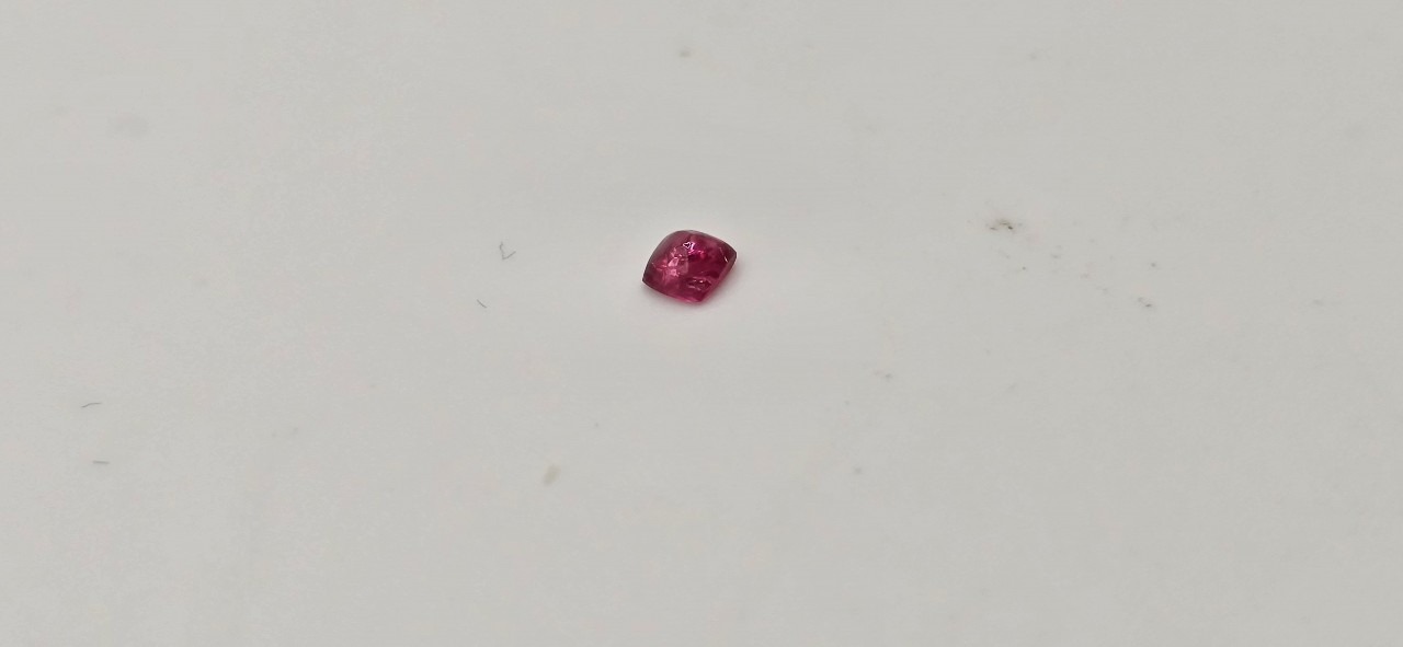 2.89x2.80x1.75mm spinel sugarloaf-cut cabochon