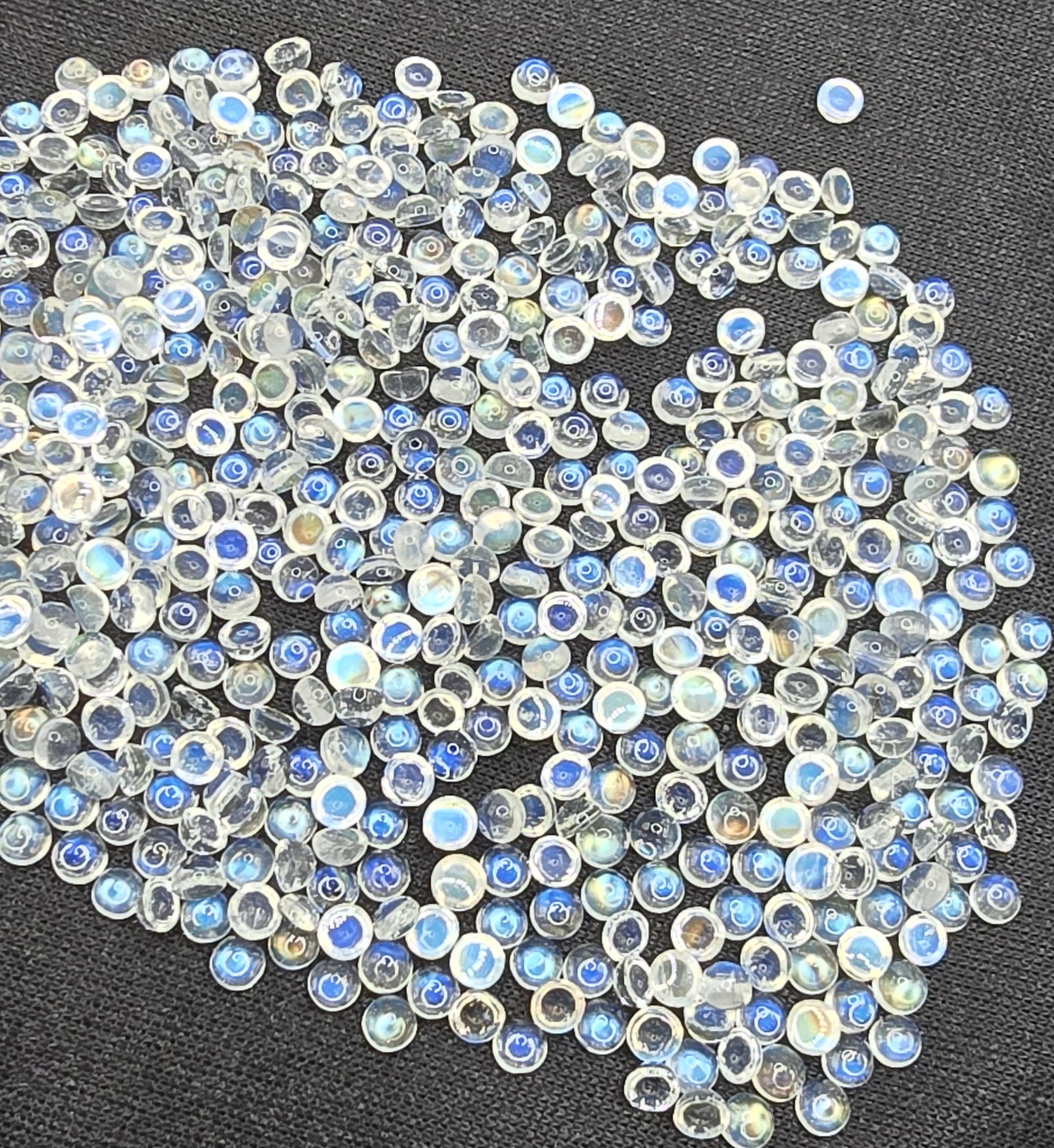 4mm round gem-grade rainbow moonstone cabochon