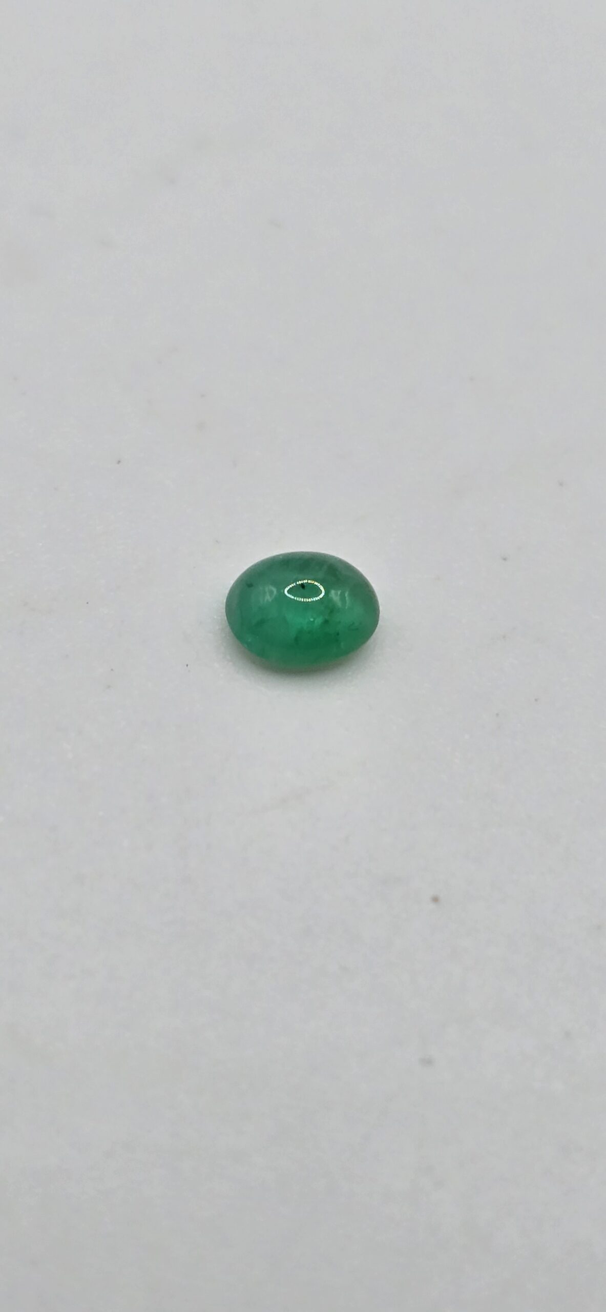 5.08x4.25x2.55mm oval-cut hq Zambian emerald cabochon