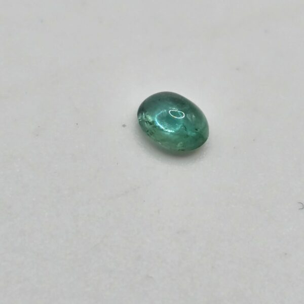 4.95x3.97x2.55mm oval-cut hq Zambian emerald cabochon