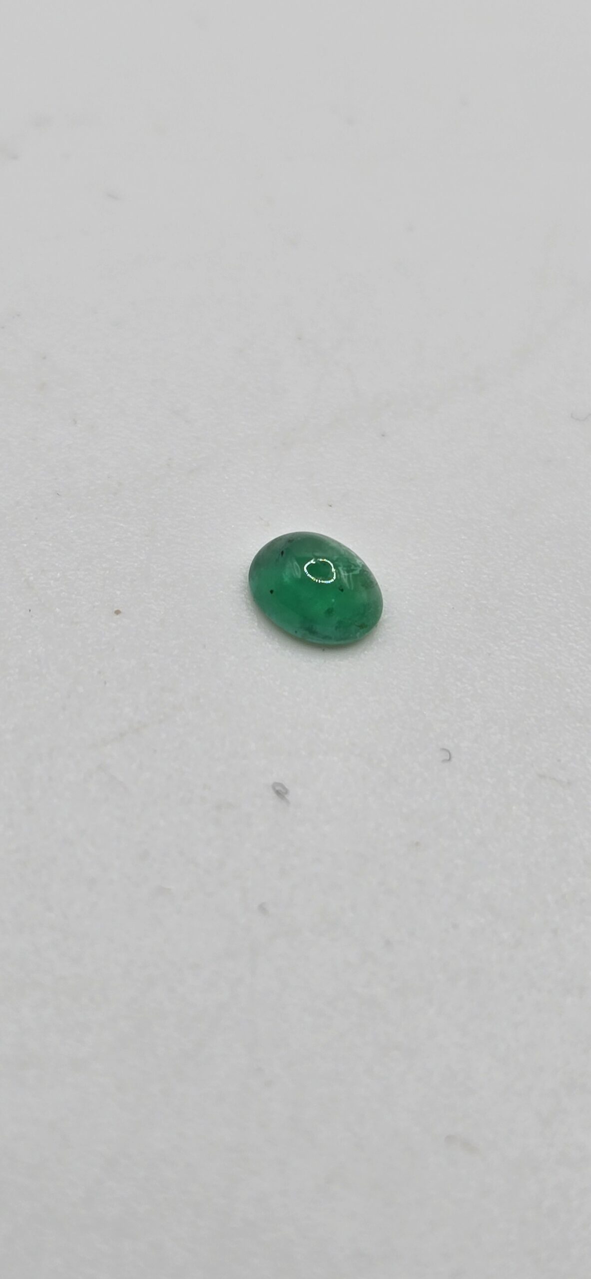 5.04x4.05x2.36mm oval-cut hq Zambian emerald cabochon
