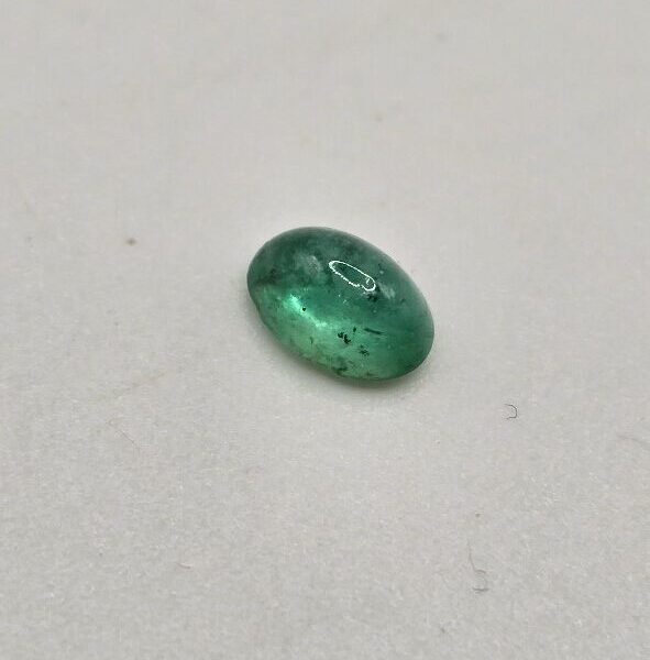 6.05x4.23x2.95mm oval-cut hq Zambian emerald cabochon