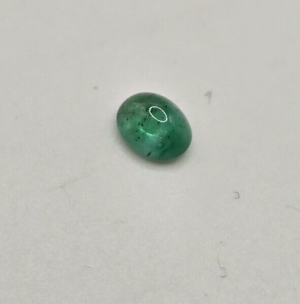5.34x4.24x2.80mm oval-cut hq Zambian emerald cabochon