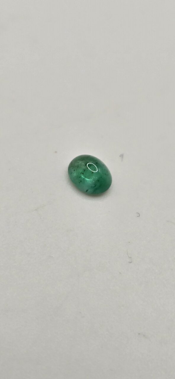 5.34x4.24x2.80mm oval-cut hq Zambian emerald cabochon