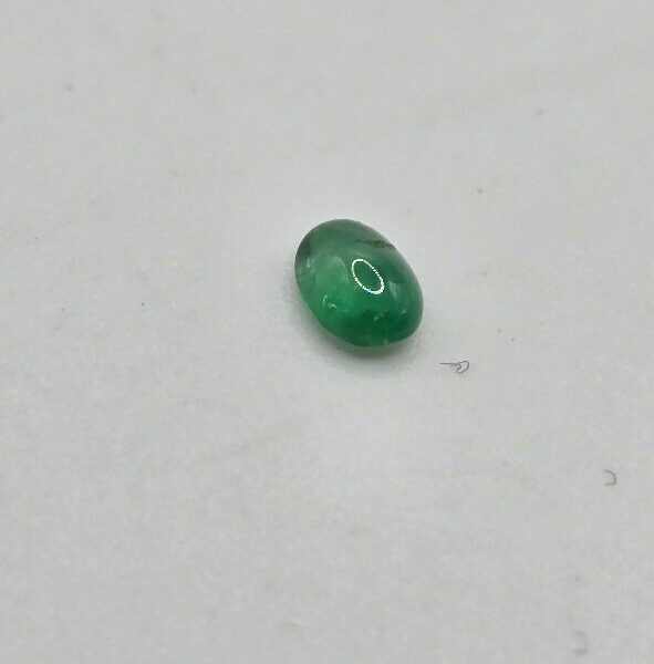 4.85x3.57x2.31mm oval-cut hq Zambian emerald cabochon