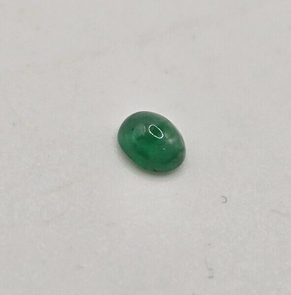 5.04x4.12x2.55mm oval-cut hq Zambian emerald cabochon