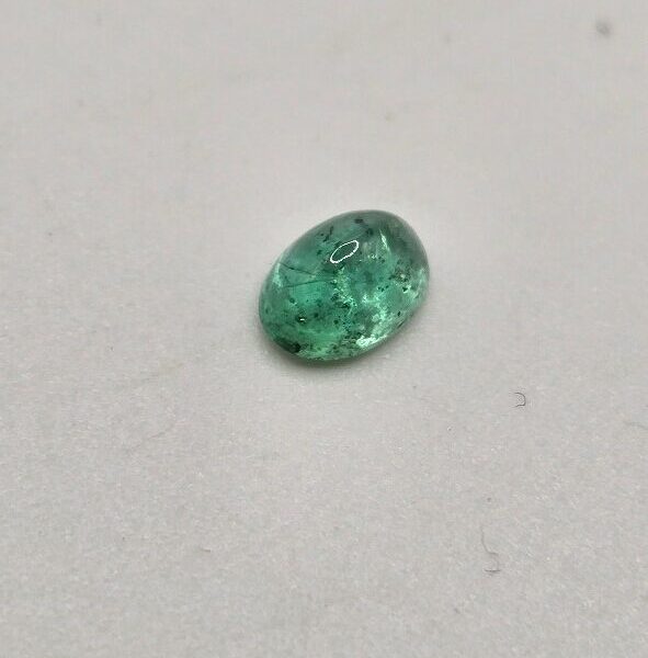 5.98x4.25x3.00mm oval-cut hq Zambian emerald cabochon