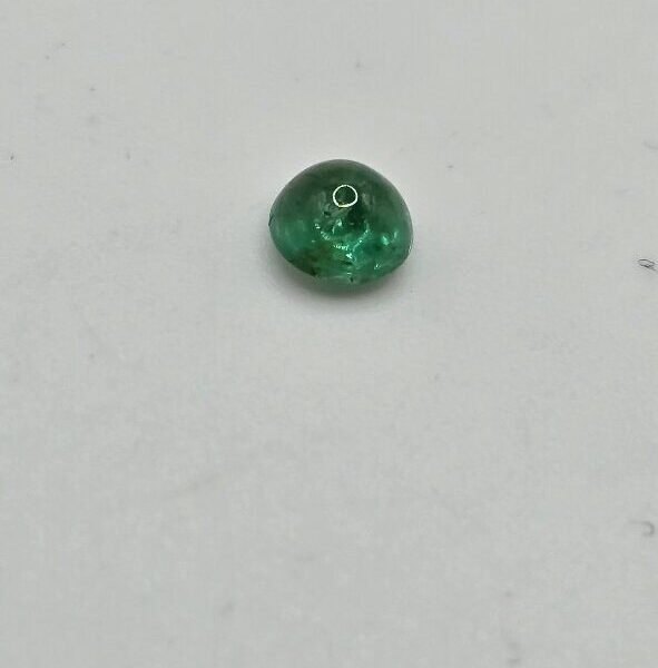 4.96x4.91x3.30mm round-cut hq Zambian emerald cabochon