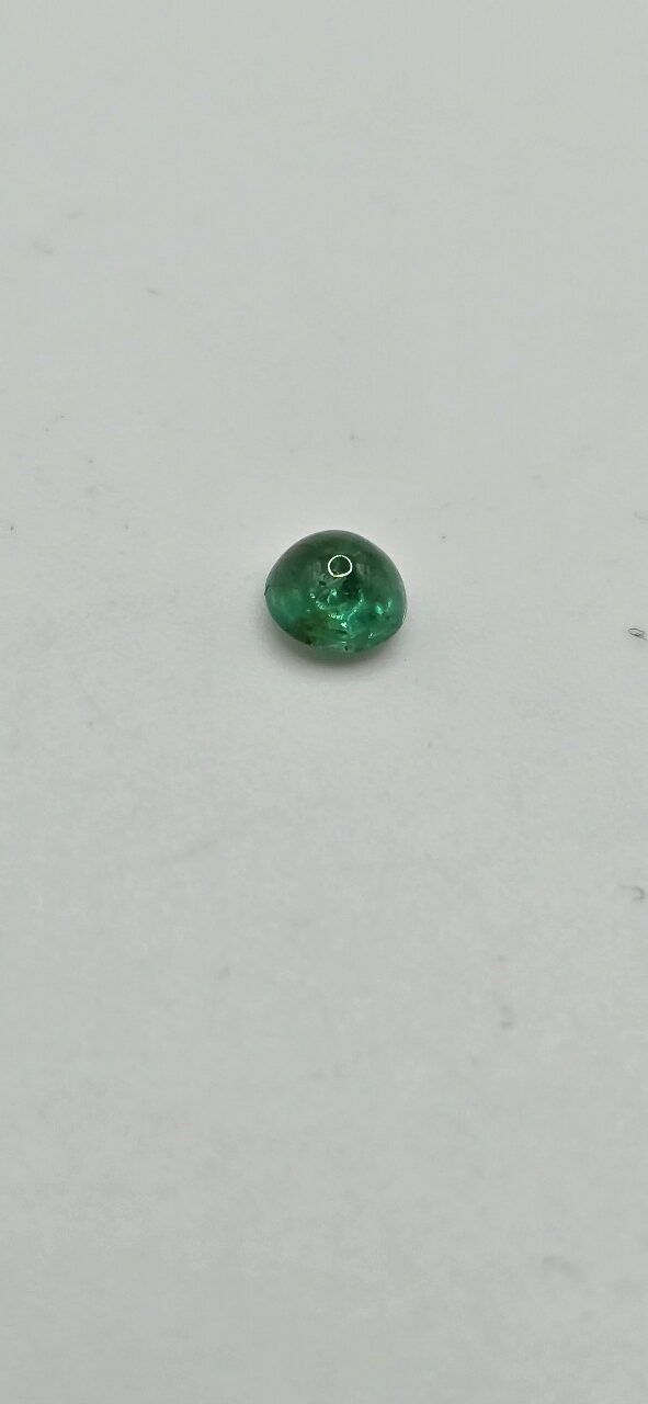 4.96x4.91x3.30mm round-cut hq Zambian emerald cabochon
