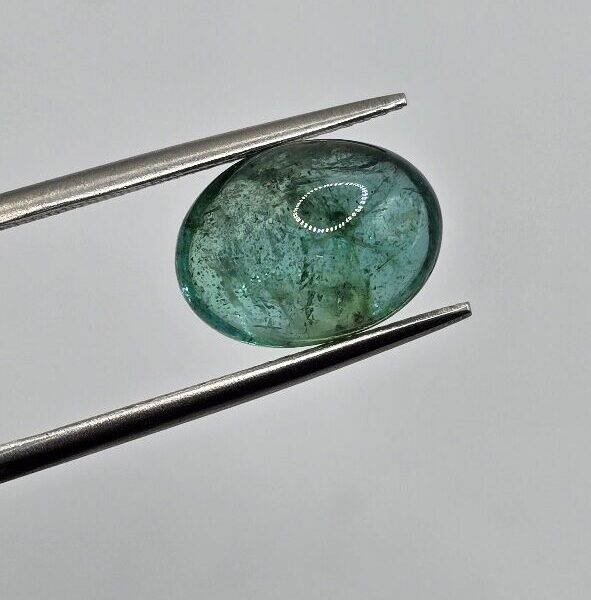 11.92x8.86x6.12mm oval-cut hq Zambian blue emerald cabochon