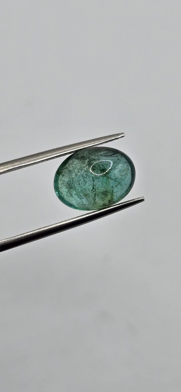 11.92x8.86x6.12mm oval-cut hq Zambian blue emerald cabochon