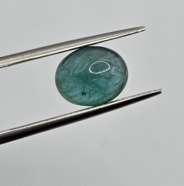 9.77x8.04x5.19mm oval-cut hq Zambian blue emerald cabochon