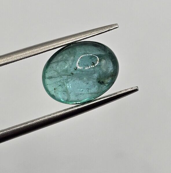 10.47x8.23x5.65mm oval-cut hq Zambian blue emerald cabochon
