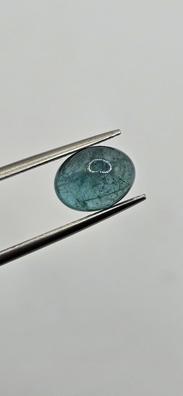 9.39x7.13x4.95mm oval-cut hq Zambian blue emerald cabochon