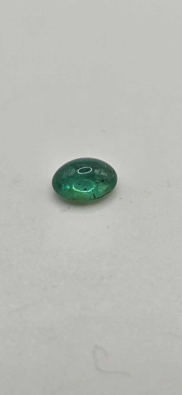 6.87x4.95x3.65mm oval-cut hq Zambian emerald cabochon