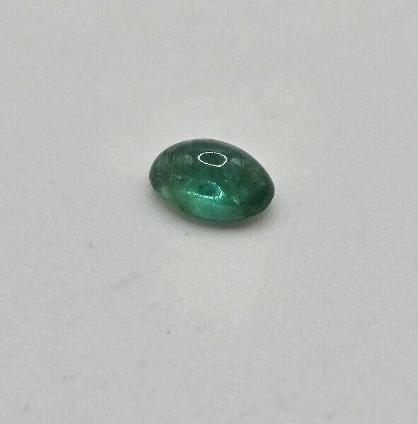6.02x4.01x3.00mm oval-cut hq Zambian emerald cabochon
