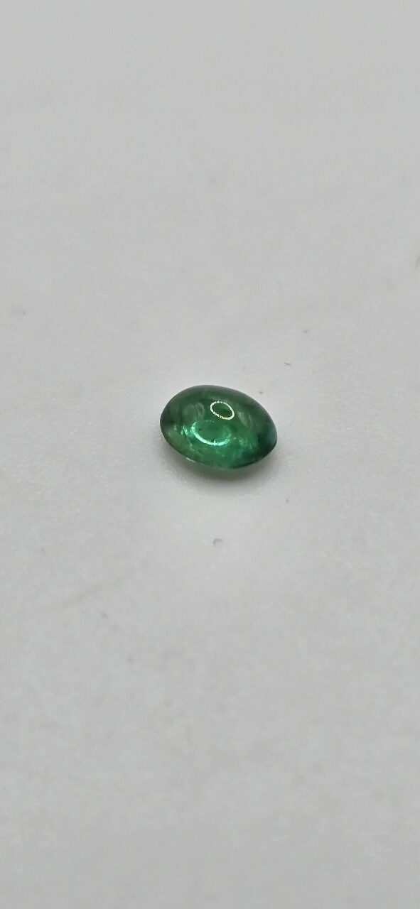 4.93x3.92x2.69mm oval-cut hq Zambian emerald cabochon