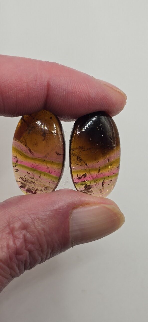 28.7x17.1x4.6mm matching pair of Madagascan liddicoatite tourmaline cabochons
