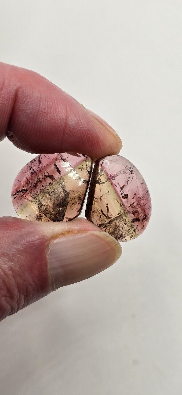 22.0x17.6x3.5mm matching pair of Madagascan liddicoatite tourmaline cabochons