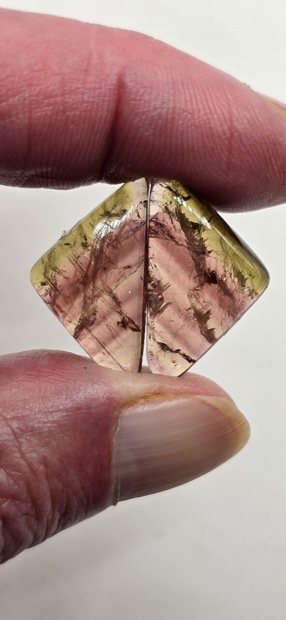 24.5x13.6x4.4mm matching pair of Madagascan liddicoatite tourmaline cabochons