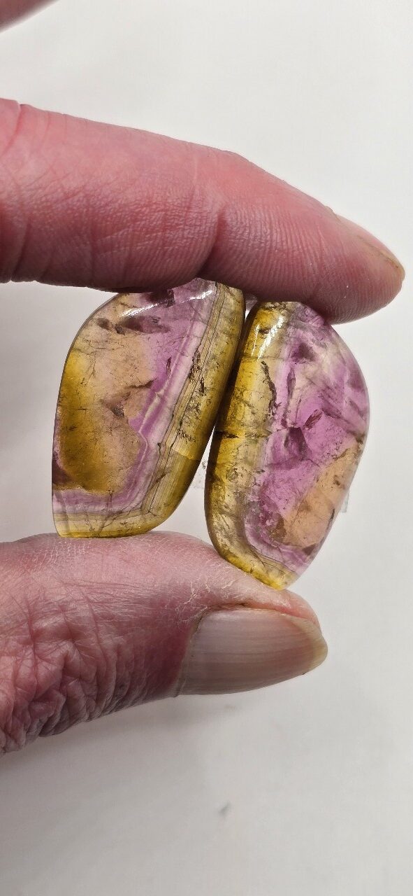 35.0x18.0x4.6mm matching pair of Madagascan liddicoatite tourmaline cabochons