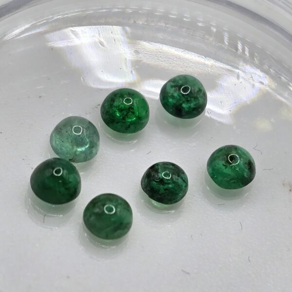 1ct parcel of 3.1-3.2mm round-cut hq Zambian emerald cabochons