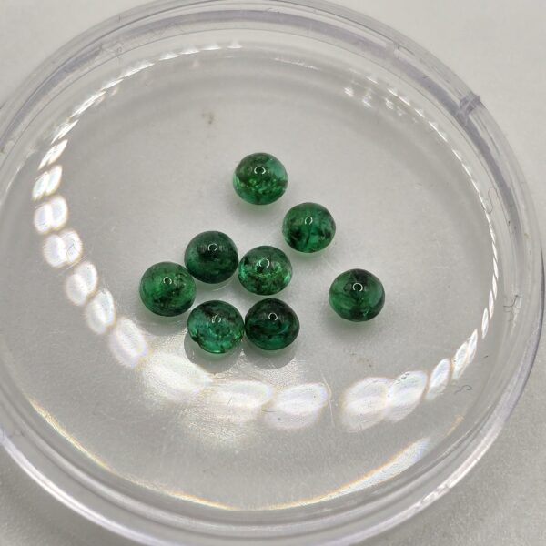 1ct parcel of 2.9-3.1mm round-cut hq Zambian emerald cabochons
