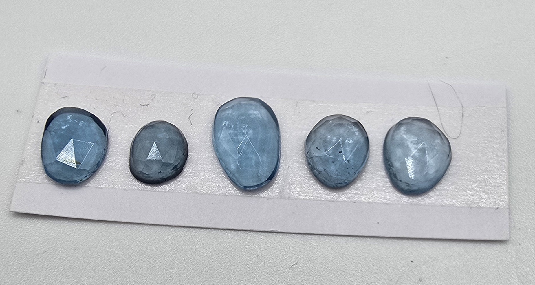 five rose cut london blue topaz cabochons