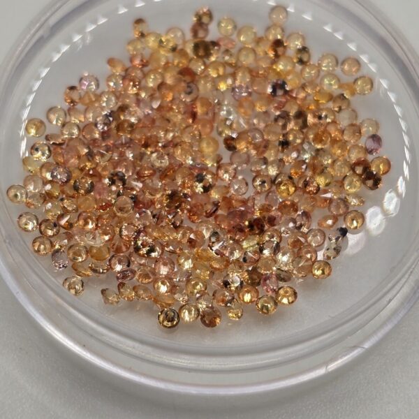 5ct parcel of 1.4mm light orange sapphire facets