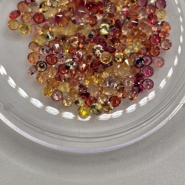 5ct parcel of 1.6mm orange-mix sapphire facets