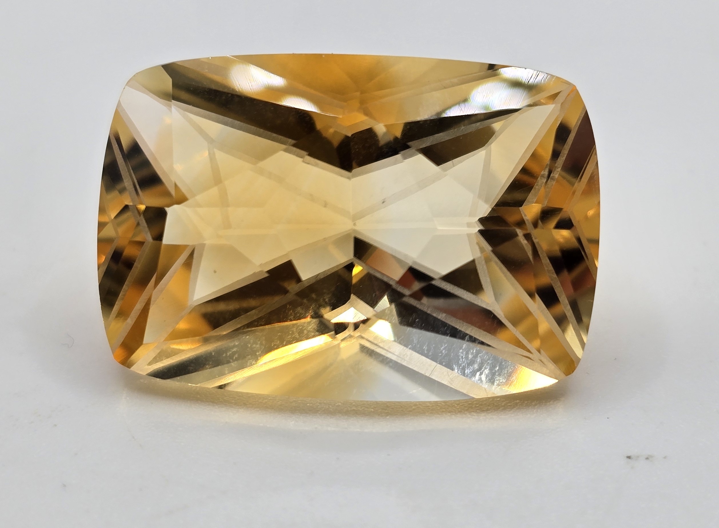 28.06x19.19x14.96mm fancy cut citrine facet