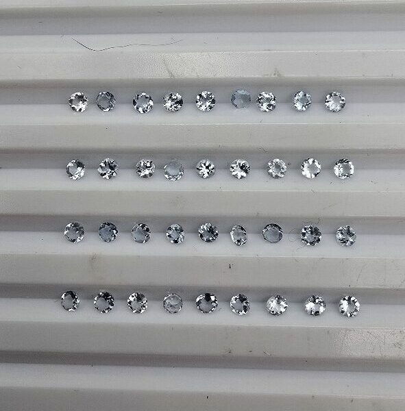 1.50ct parcel of 2.5mm melee round aquamarine facets