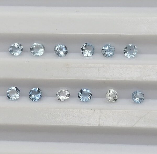 0.51ct parcel of 2.21 2.30mm melee round aquamarine facets