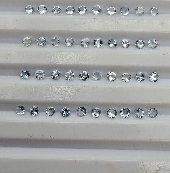 0.51ct parcel of 2.11 2.20mm melee round aquamarine facets