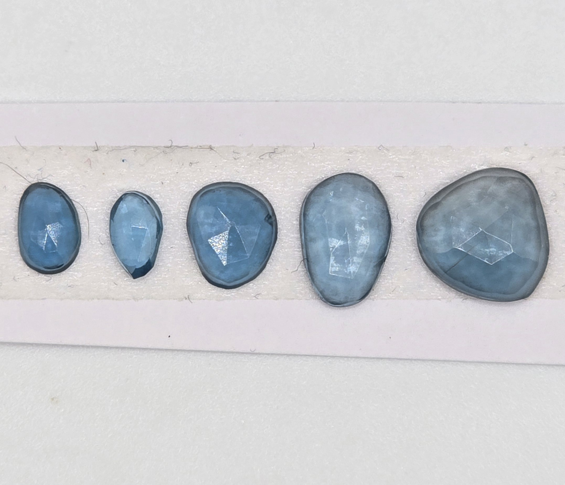 five rose cut london blue topaz cabochons