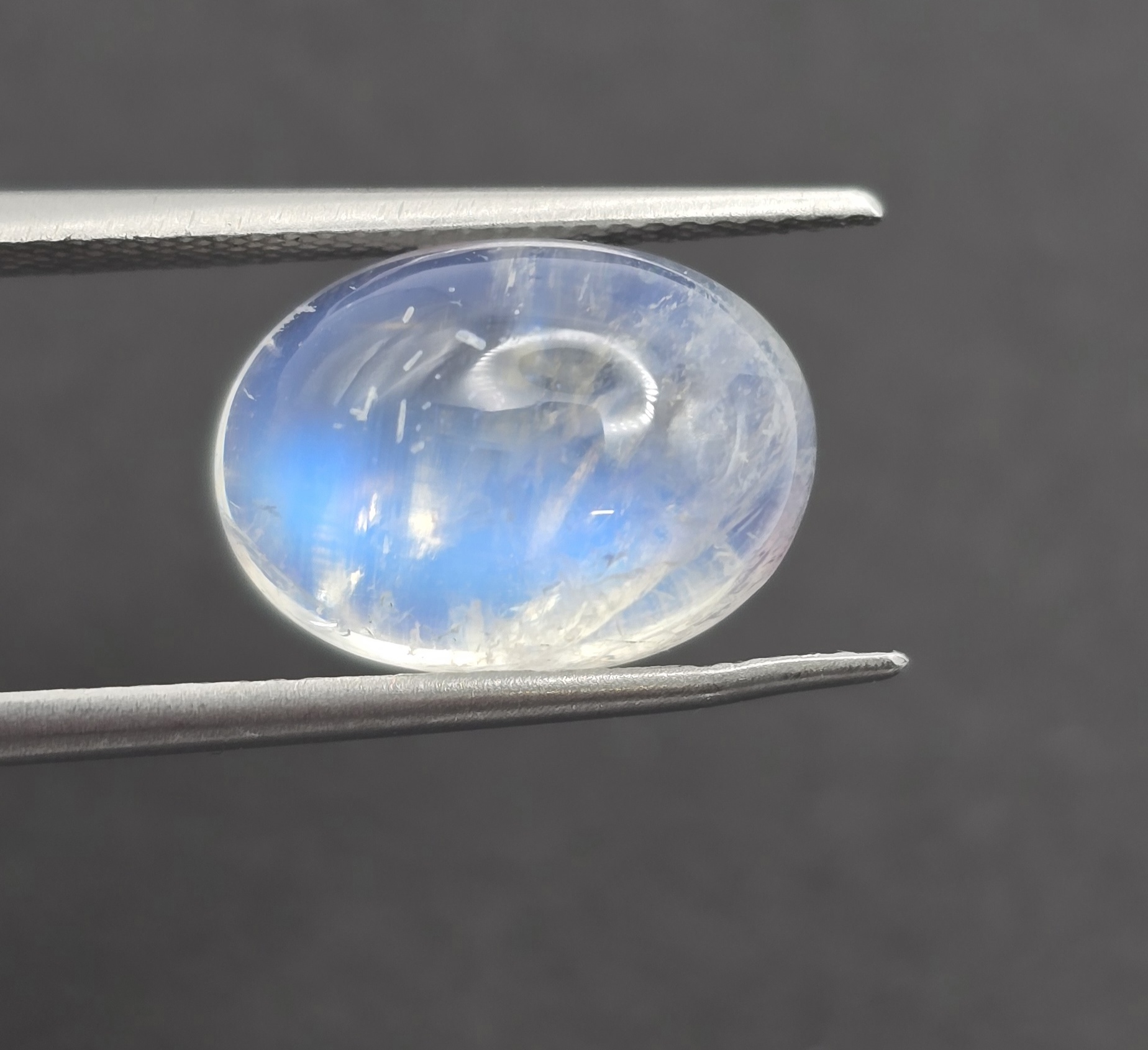 13.9x10.1x6.6mm oval gem-grade rainbow moonstone cabochon