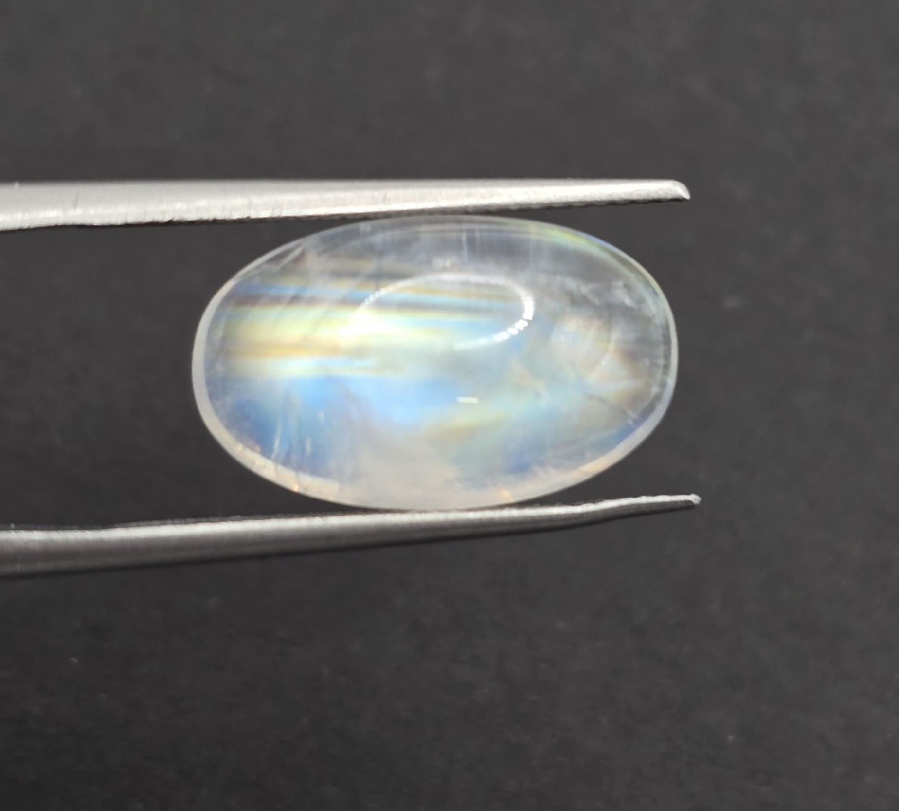 17.2x10.5x6.2mm oval gem-grade rainbow moonstone cabochon