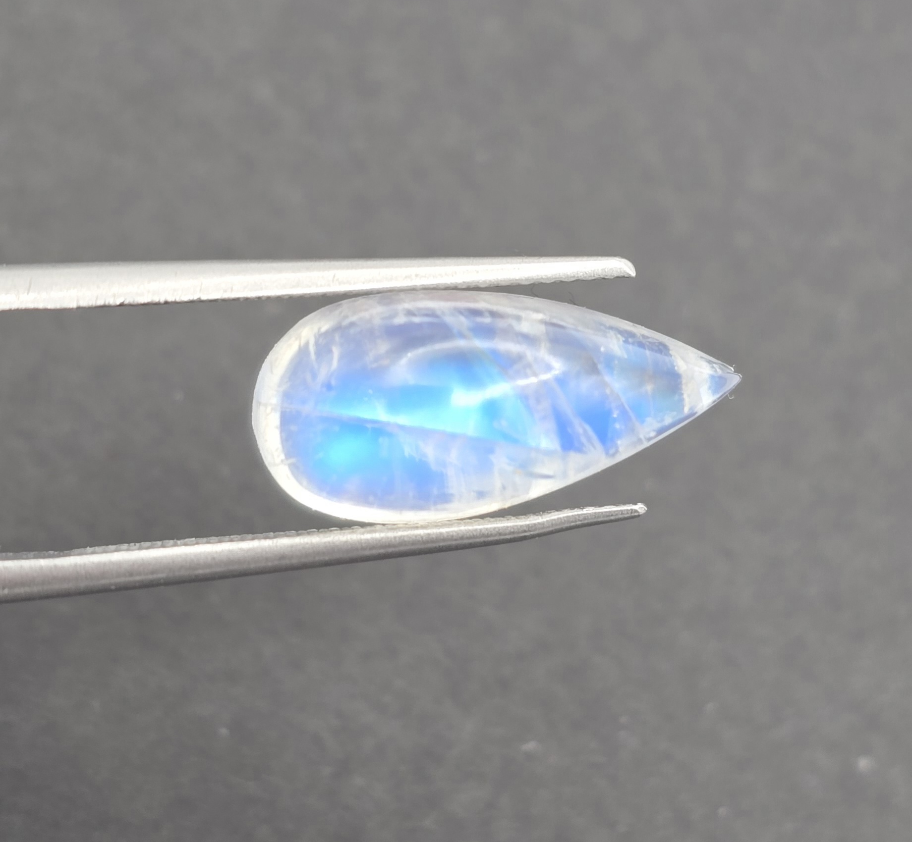 18.0x8.5x6.9mm pear gem-grade rainbow moonstone cabochon