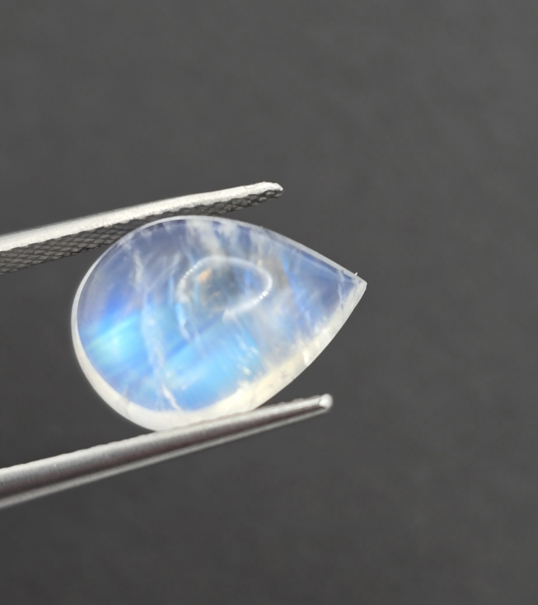 13.9x10.0x5.9mm pear gem-grade rainbow moonstone cabochon