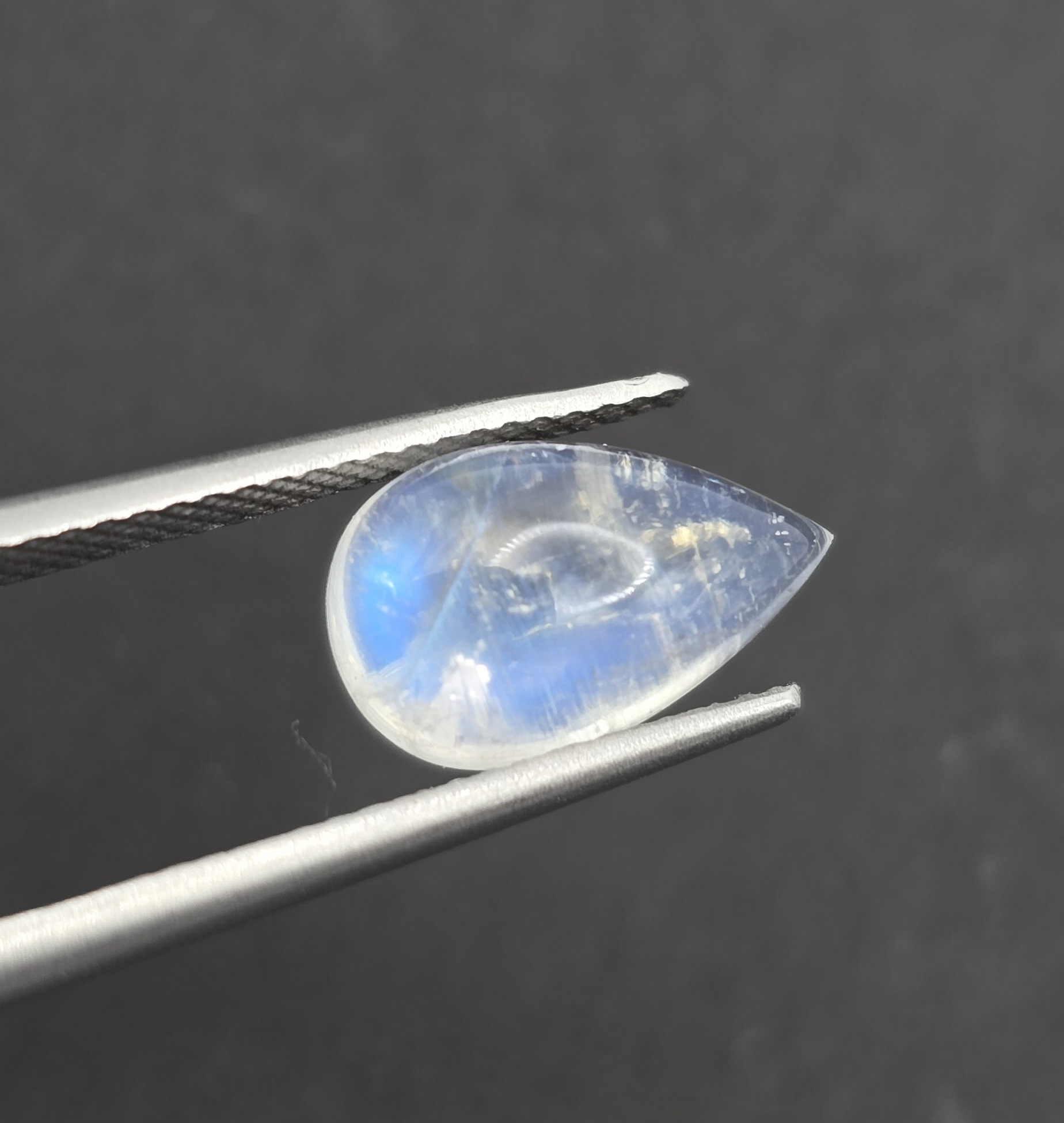 11.4x7.3x4.7mm pear gem-grade rainbow moonstone cabochon