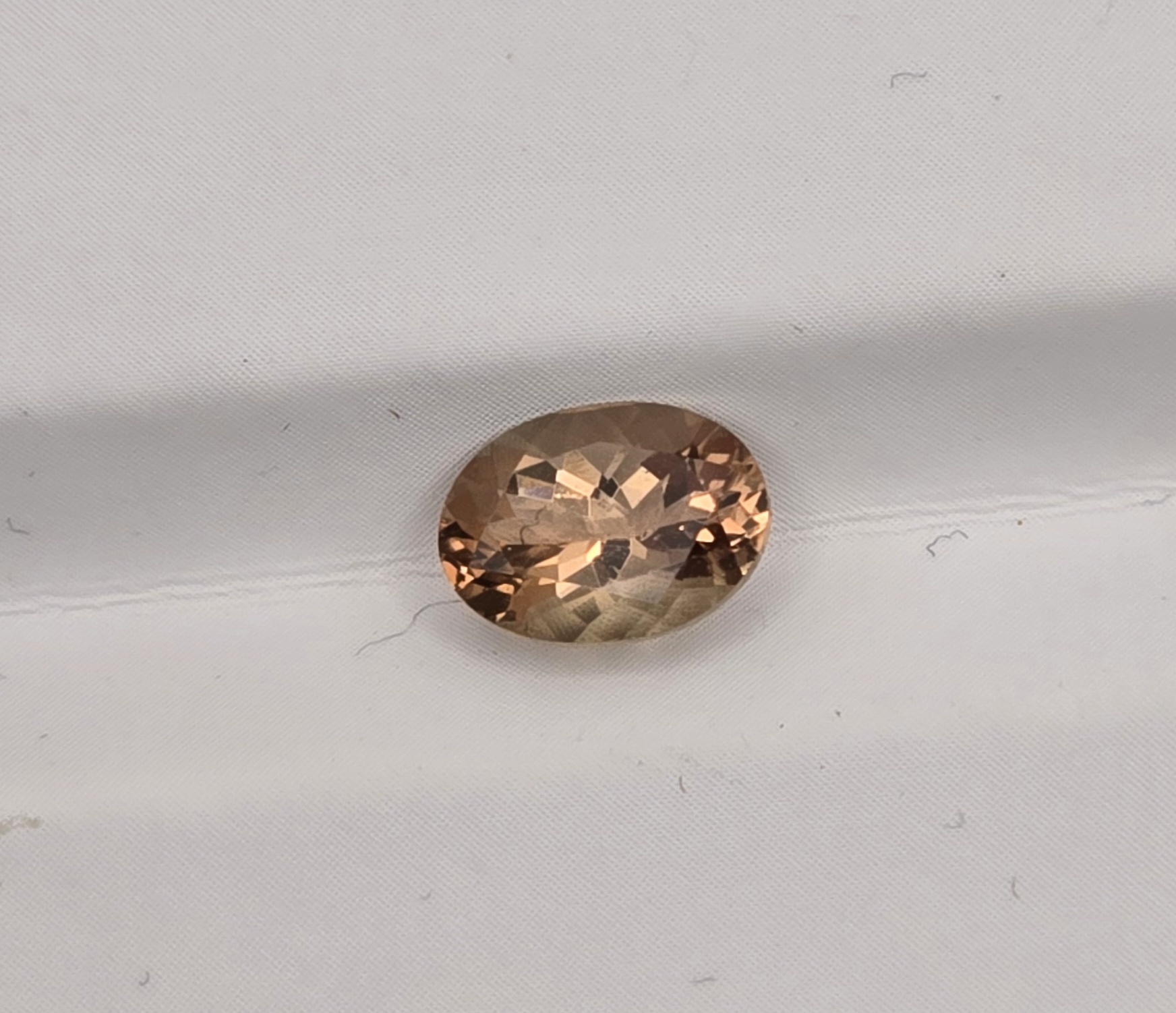 8x6mm oval sunstone facet