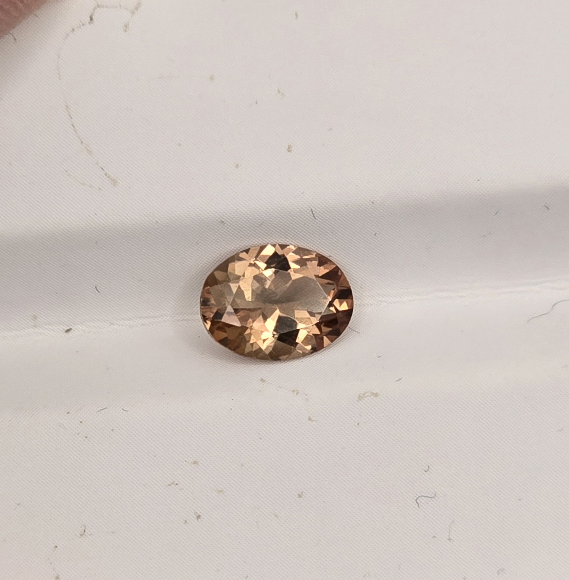 8x6mm oval sunstone facet